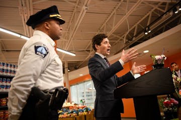 Minneapolis Police Chief Medaria Arradondo stood beside Minneapolis Mayor Jacob Frey as Frey addressed the media Thursday about police-community relat