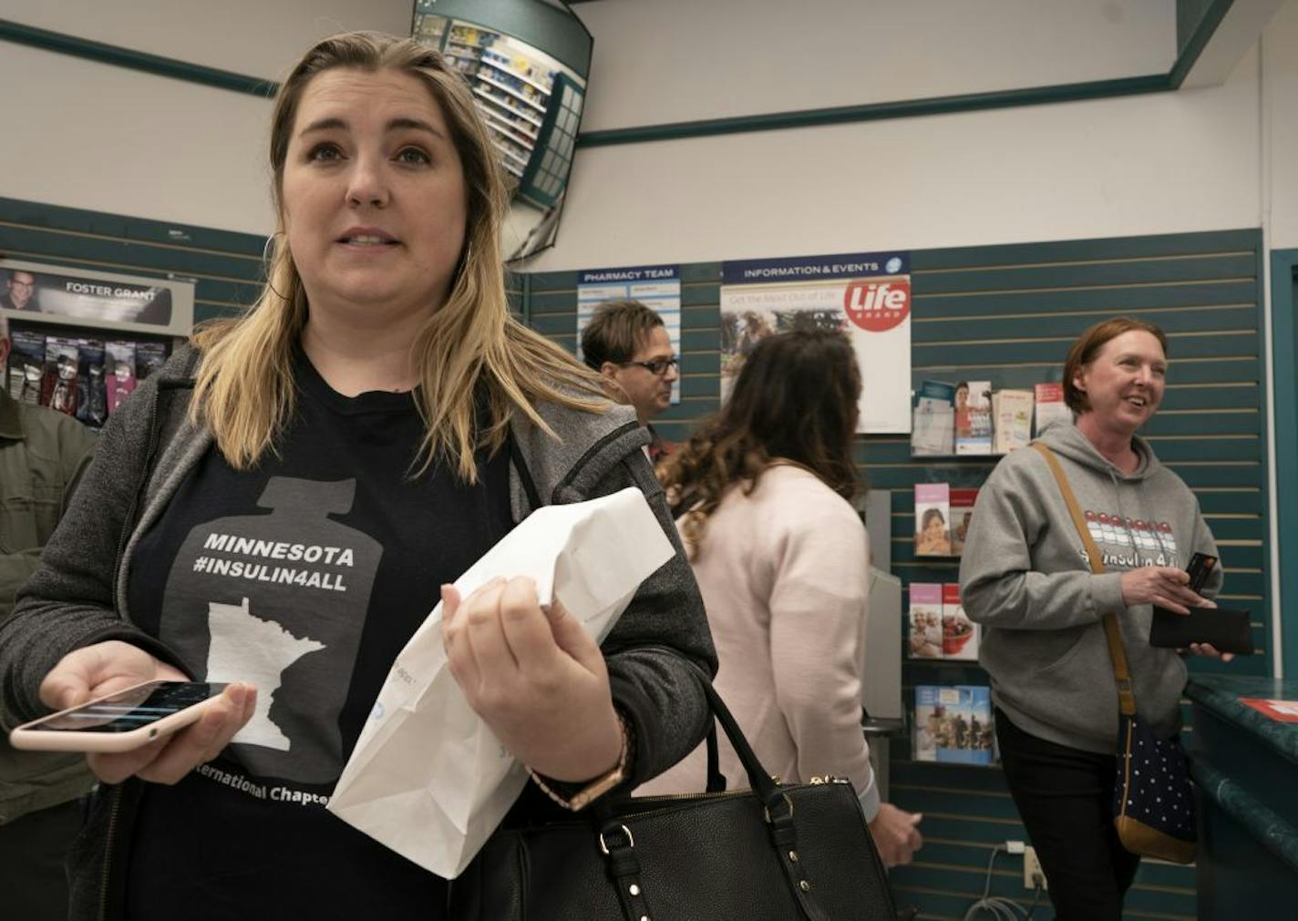 Quinn Nystrom, left, Travis Paulson, Vicky Luedtke and Nicole Smith-Holt reached their destination, Shoppers Drug Market pharmacy in Fort Frances, Ontario, to buy insulin last weekend.