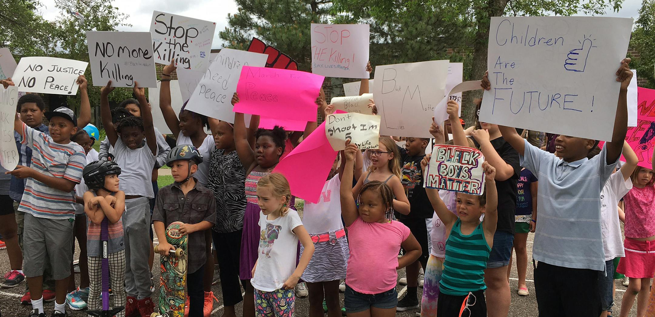Sunday midday children's march from Maxfield Elementary to JJ Hill school in St. Paul, which is where Philando Castile worked.