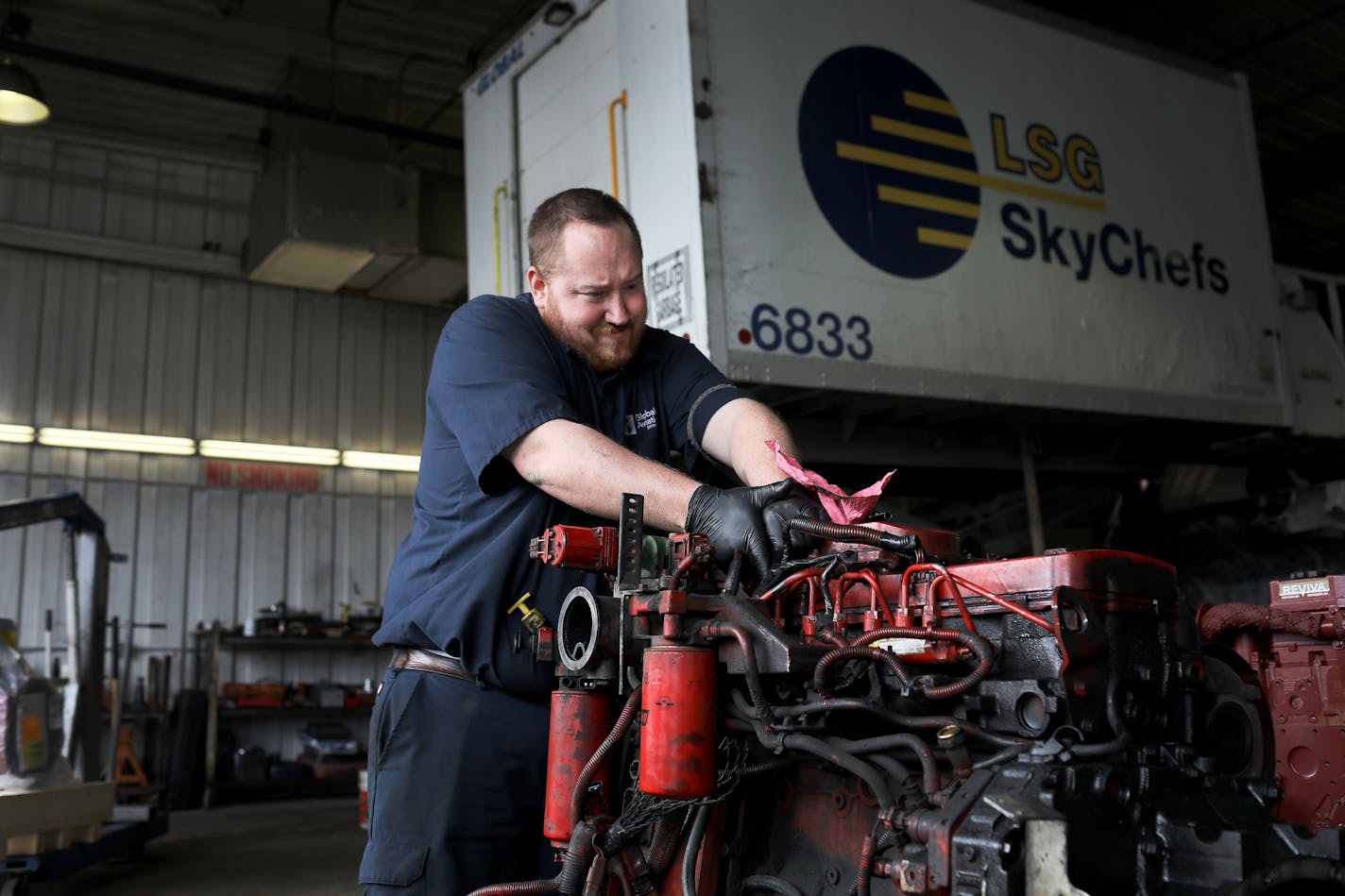 Global Aviation Services mechanic Bob Walker works to remove an engine strap to put on a new diesel engine he was going to install in a catering truck at MSP Wednesday, April 24, 2019, in Minneapolis, MN. During the summer months 27,000 to 30,000 bags are handled daily at MSP.] DAVID JOLES &#x2022;david.joles@startribune.com When the Department of Labor showed up at their office with back wage and child labor law complaints, leaders at Global Aviation Services, LLC knew they needed to change the