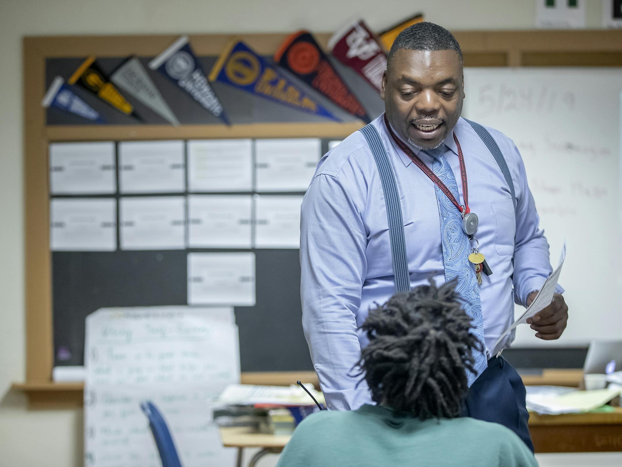 English teacher Roy Pierson explained an assignment to the boys at Boys Totem Town, Friday, May 24, 2019. The group of young men will be the last class at the facility. Boys Totem Town will soon close its doors as part of a larger juvenile justice trend away from out-of-home placements in favor of community programs.