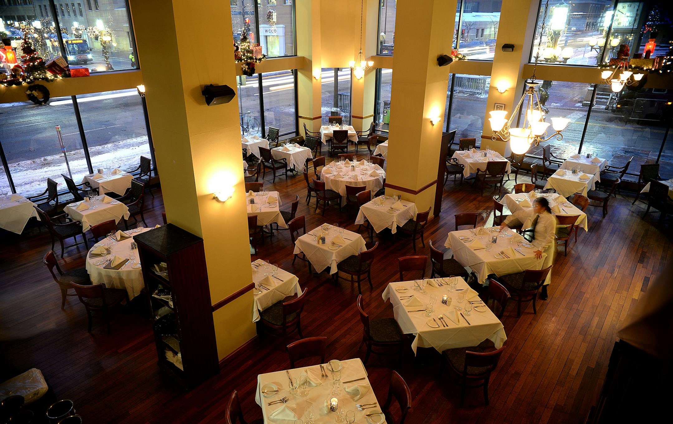 Waitstaff prepares Vincent's dining room for dinner. ] (SPECIAL TO THE STAR TRIBUNE/BRE McGEE) **