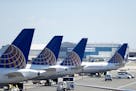 United Airlines jets sit at a gate at Newark Liberty International Airport earlier this year.