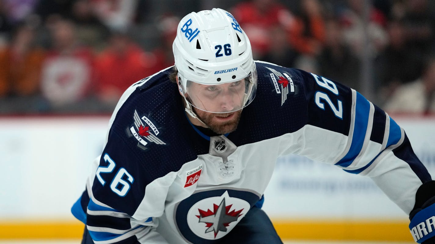 Winnipeg Jets right wing Blake Wheeler (26) plays against the Detroit Red Wings in the first period of an NHL hockey game Tuesday, Jan. 10, 2023, in Detroit. (AP Photo/Paul Sancya)