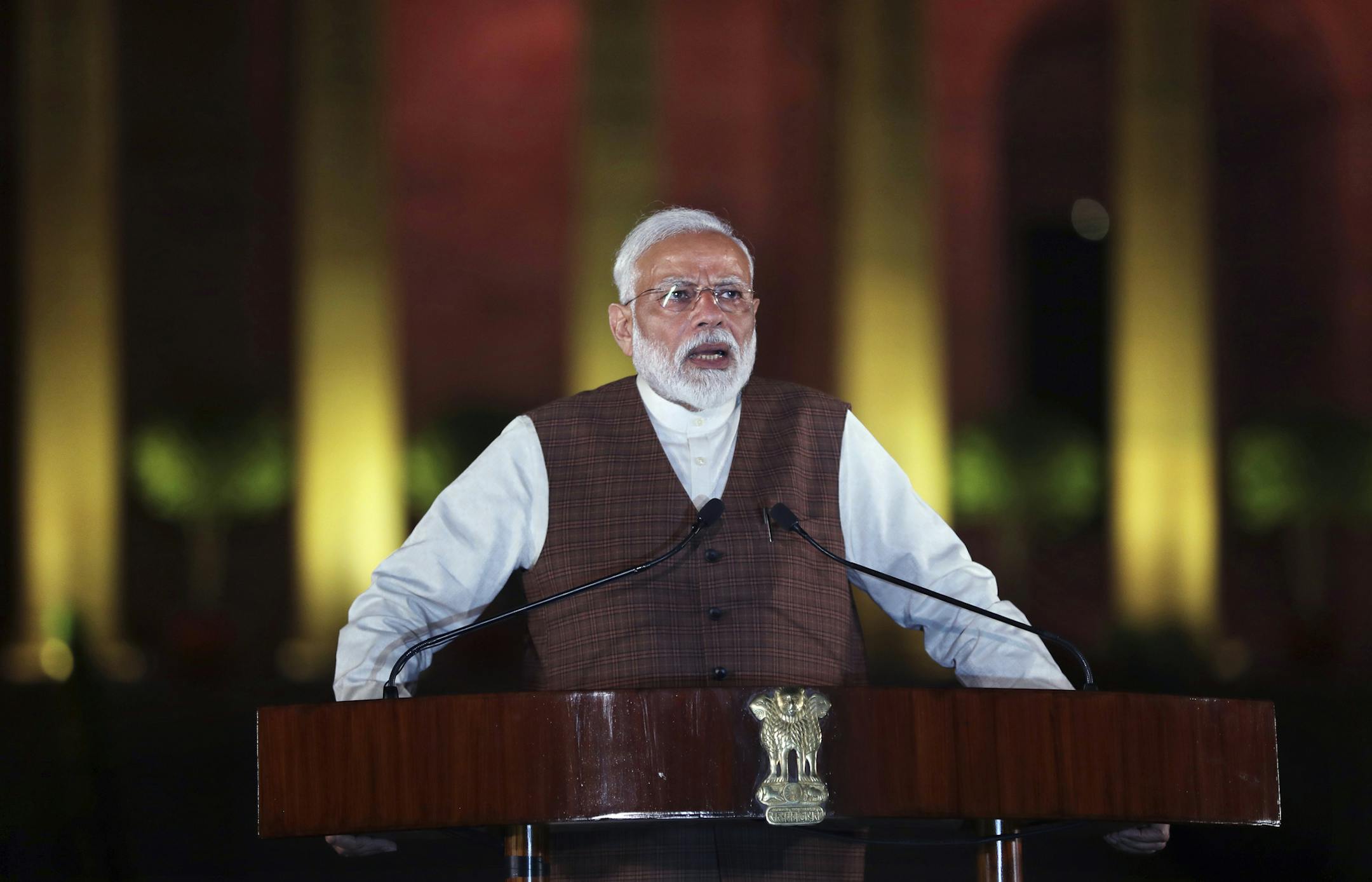 Indian Prime Minister Narendra Modi speaks to the media after meeting with the President to stake claim to form the government in New Delhi, India, Saturday, May 25, 2019. Newly elected lawmakers from India's ruling alliance led by the Hindu nationalist Bharatiya Janata Party elected Narendra Modi as their leader on Saturday, paving the way for his second five-year term as prime minister after a thunderous victory in national elections. (AP Photo/Manish Swarup) ORG XMIT: XMS101