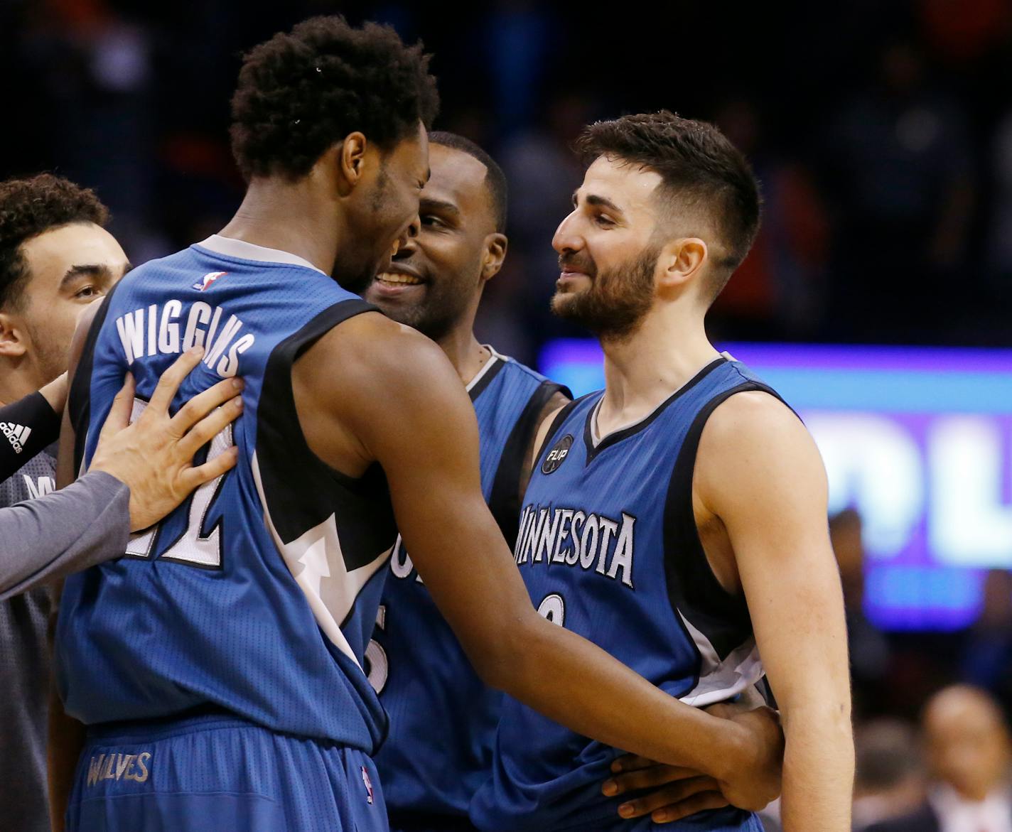 Timberwolves guard Ricky Rubio, right, celebrated with teammate Andrew Wiggins after Rubio's last-second three-pointer lifted the Wolves over Oklahoma City 99-6 on Friday.