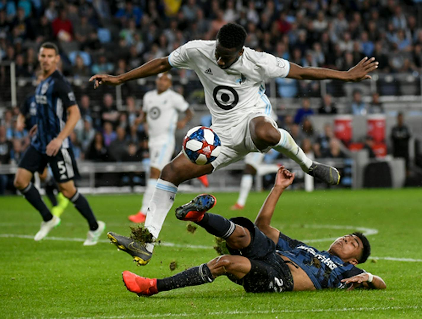 Minnesota United midfielder Kevin Molino (7) hopped over Los Angeles Galaxy defender Julian Araujo (22) in the second half. ]   Aaron Lavinsky ¥ aaron.lavinsky@startribune.com