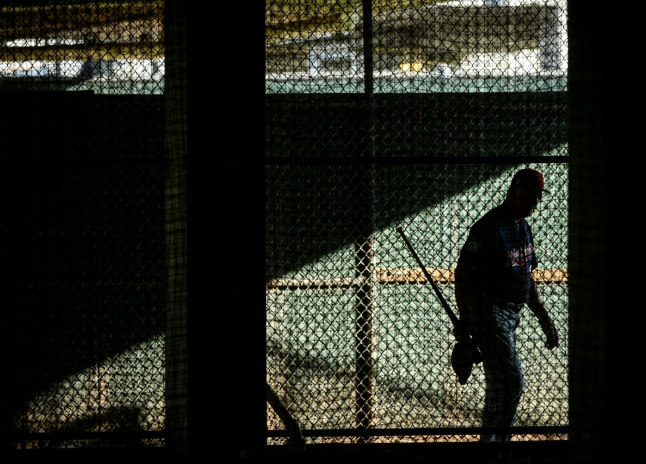 Twins staffer Phil Roof walked back toward the clubhouse Saturday afternoon after workouts.