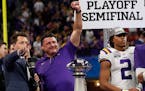 LSU coach Ed Orgeron and the Tigers celebrated winning the Peach Bowl playoff game against Oklahoma on Dec. 28