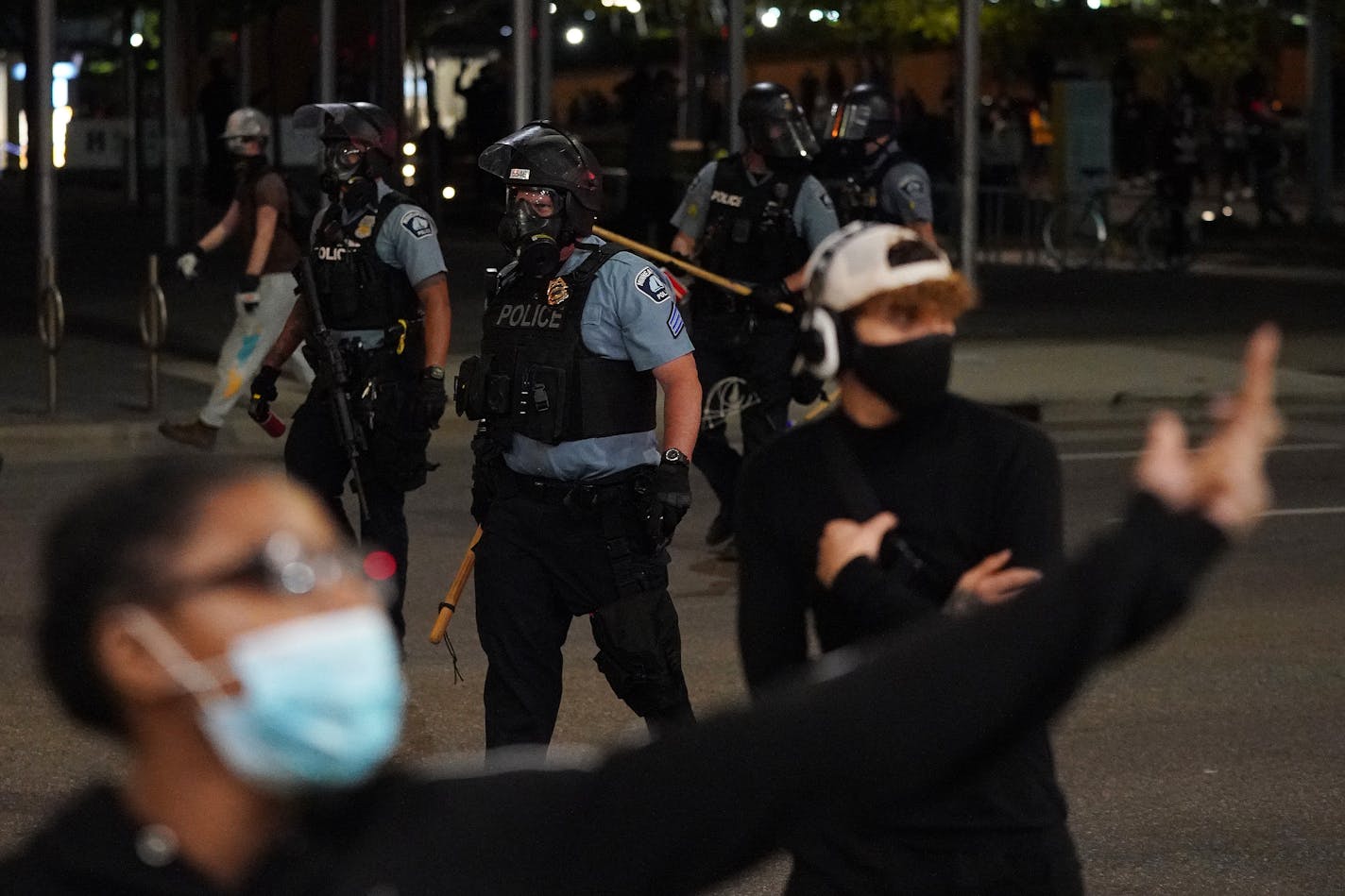 Police used pepper spray and rubber bullets to disperse protestors at the intersection of South 4th Street and Nicollet Mall in downtown Minneapolis Thursday night. ] ANTHONY SOUFFLE • anthony.souffle@startribune.com