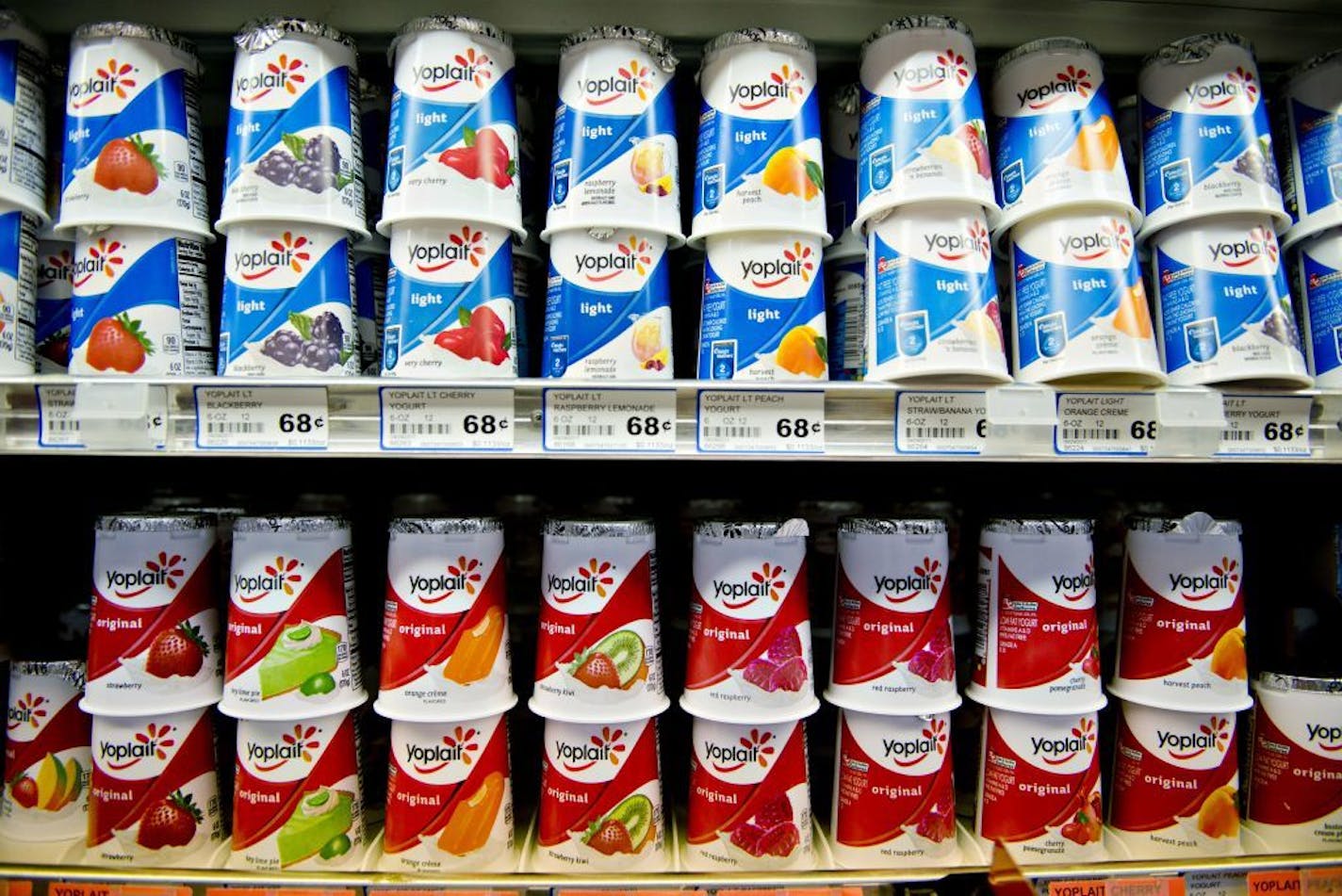 General Mills Inc. Yoplait brand yogurt sits on display at a supermarket in Princeton, Illinois, U.S., on Tuesday, Sept. 17, 2013. General Mills, Inc., said net sales rose 8 percent to $4.37 billion. Photographer: Daniel Acker/Bloomberg