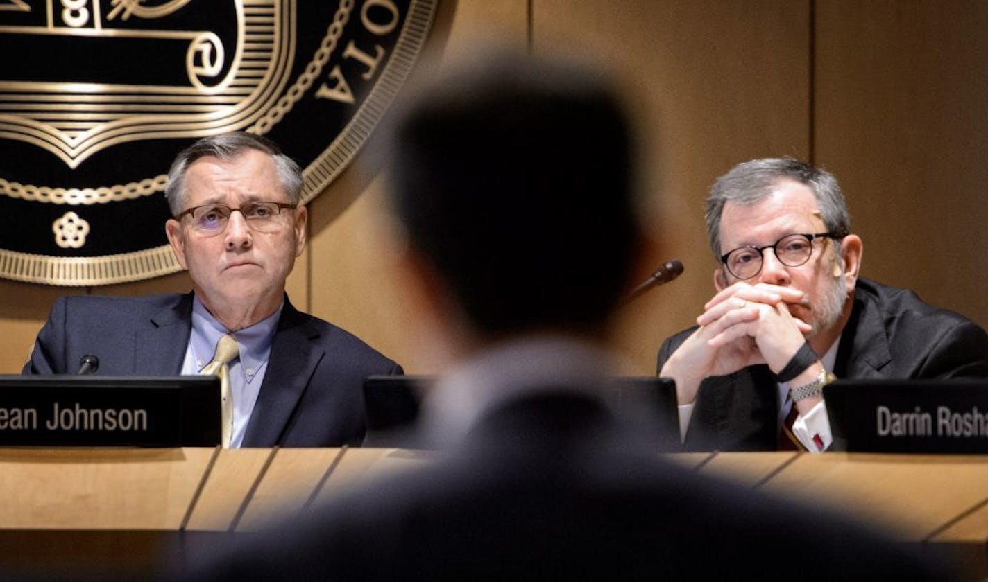 Board of Regents Chairman Dean Johnson and President Eric Kaler listened as attorneys Joe Dixon and Karen Schanfeld delivered their report to the Board of Regents.