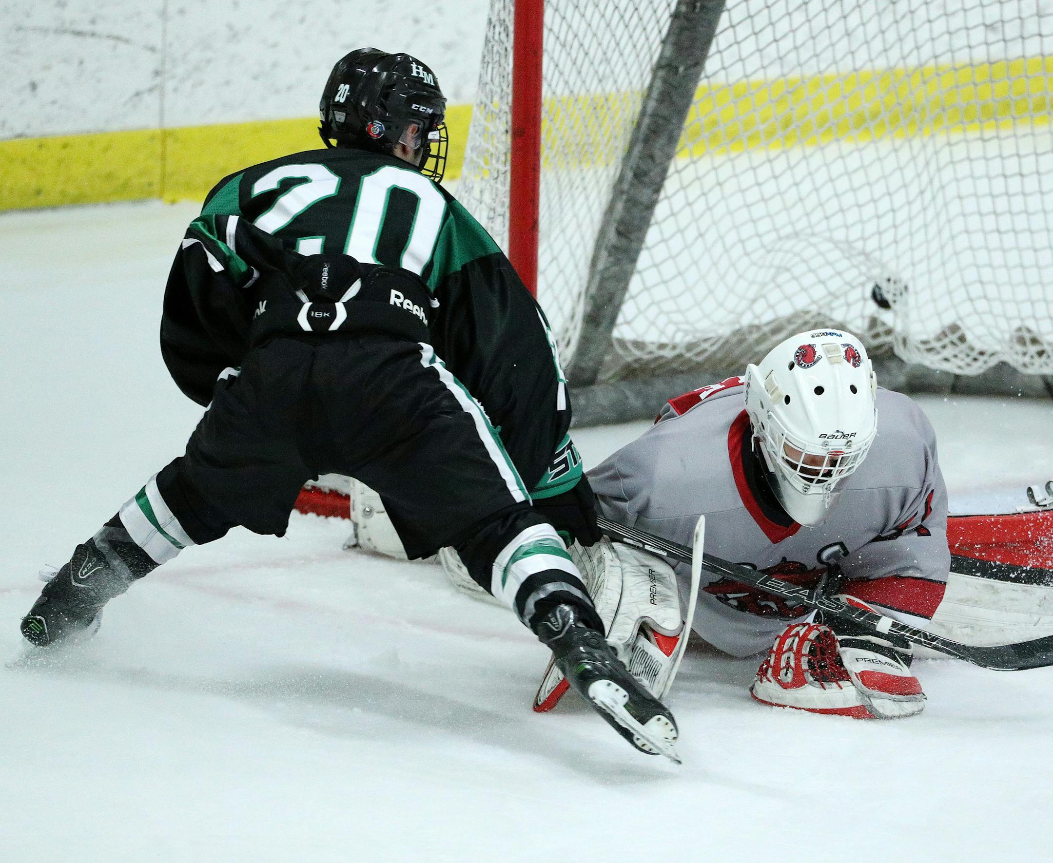Hill-Murray's Brock Bremer (20) scored a goal on Stillwater goaltender Seth Eisele (31) in the first period. ] ANTHONY SOUFFLE ï anthony.souffle@startribune.com Hill-Murray played Stillwater in the boys hockey, Class 2A, Section 4 final Friday, May 3, 2017 at Aldrich Arena in Maplewood, Minn.