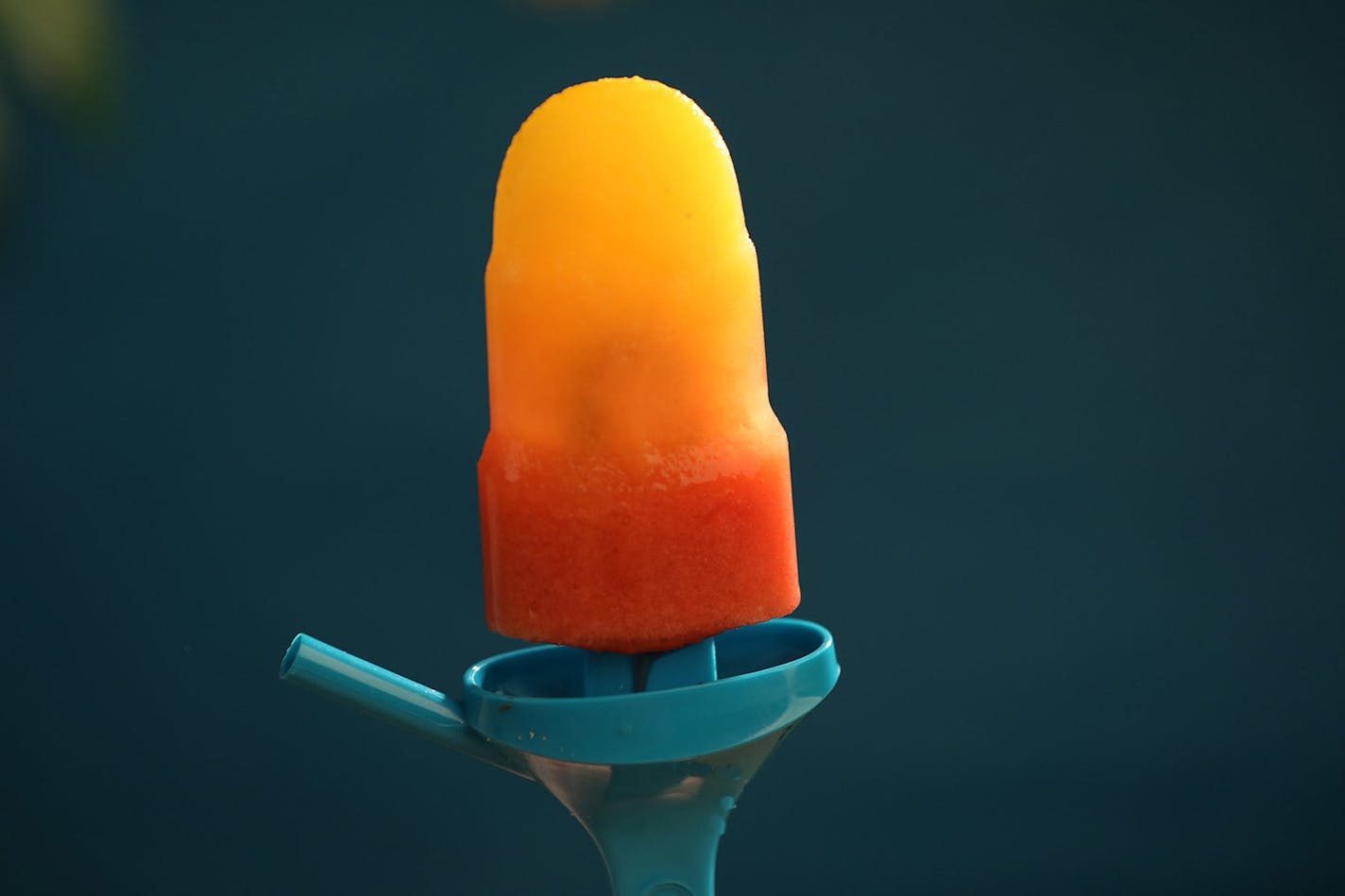 Homemade popsicles cool you down on a hot day, including this Orange Strawberry Sunrise Popsicle. (J.B. Forbes/St. Louis Post-Dispatch/TNS) ORG XMIT: 1234675