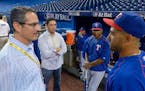 Texas Rangers assistant general manager Thad Levine, left.