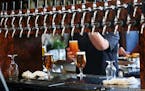 Beer is drawn from many taps inside the restaurant at Stone Brewery on Oct. 12, 2016 in Escondido, Calif.