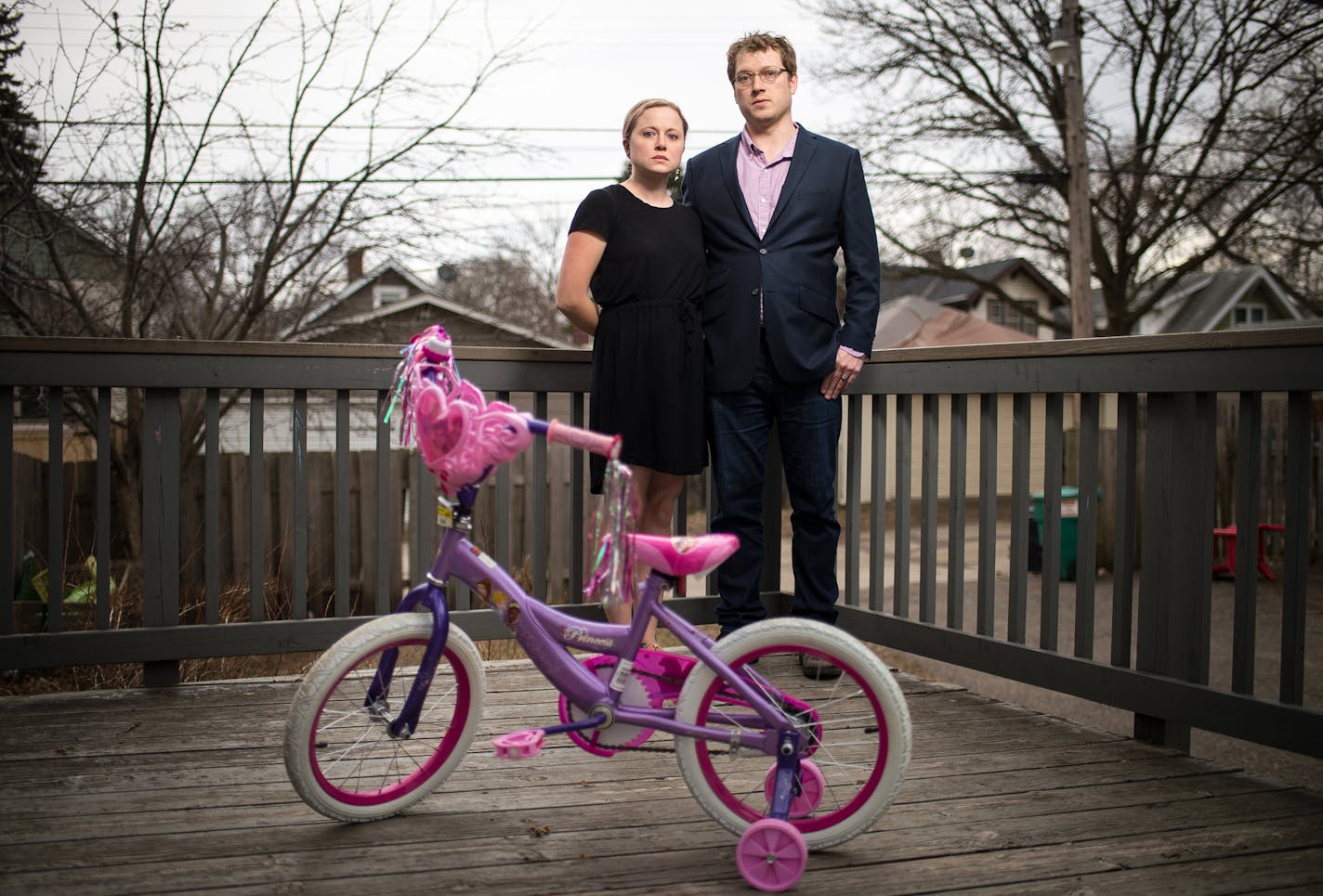 Hannah and David Edwards were photographed behind their home with their 5-year-old daughter's bicycle on Tuesday, April 12, 2016 in St. Paul, Minn. ] (AARON LAVINSKY/STAR TRIBUNE) aaron.lavinsky@startribune.com The transgender rights debate is hitting around the country from North Carolina to a charter school in St. Paul, where two parents have filed a gender discrimination charge against Nova Classical Academy for denying their child full educational opportunities because of her gender identity