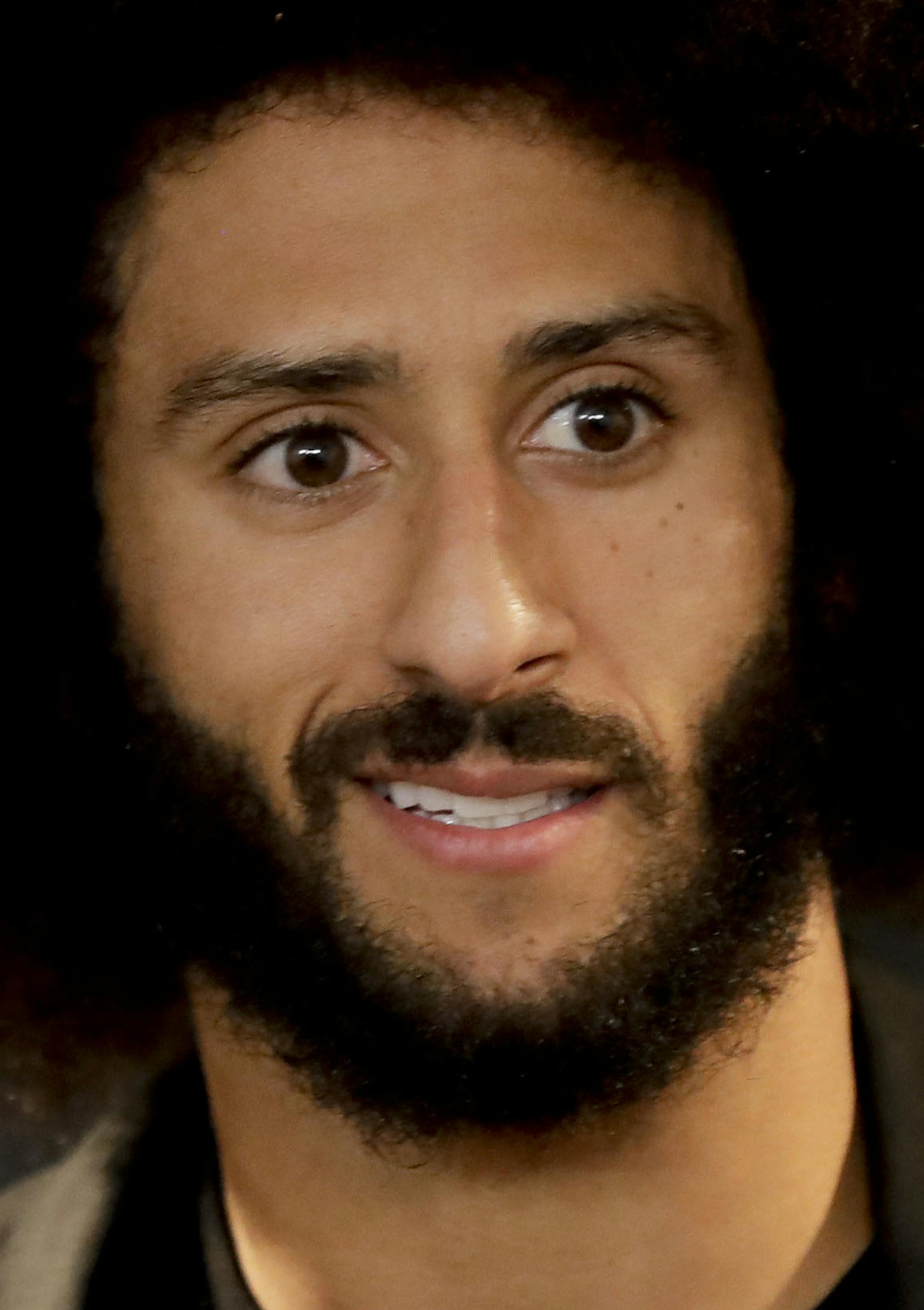 San Francisco 49ers quarterback Colin Kaepernick talks during a news conference after an NFL football game against the Los Angeles Rams Saturday, Dec. 24, 2016, in Los Angeles. The San Francisco 49ers won 22-21. (AP Photo/Rick Scuteri)