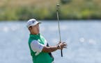 Hideki Matsuyama watches his shot on the 17th hole during the 2022 R. S. Hughes Championship Pro-Am, in Blaine, Minn., on Wednesday, July 20, 2022. ] 