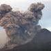 Mount Sinabung spews volcanic materials as seen from Gundaling, North Sumatra, Indonesia, Wednesday, Jan. 8, 2014. The volcano has sporadically erupte