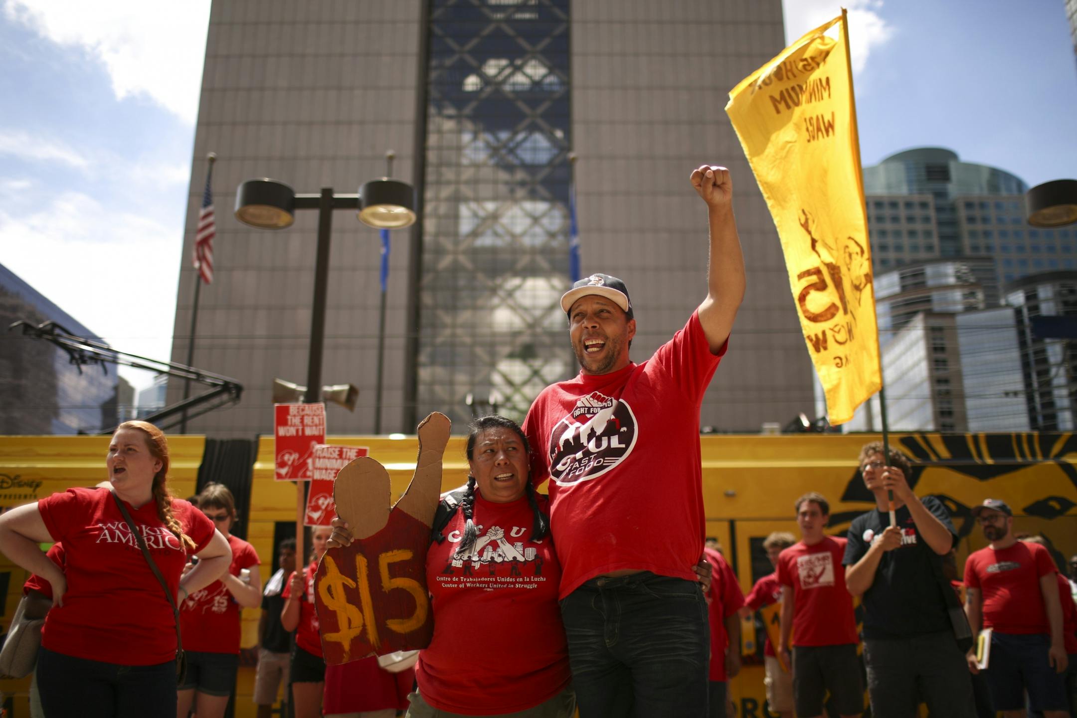 Lucila Dominguez and Steven Suffridge were among those who rallied and marched around City Hall before delivering the petition.