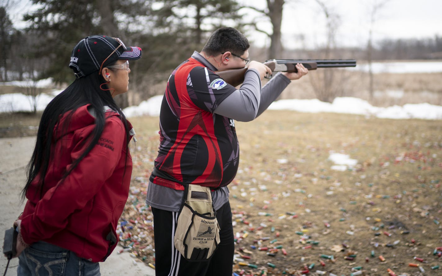 Shakopee High School trap shooter Jaz Krulikosky practiced while his mother, Rheanna Haeg, the team's first-year coach, observed at the Minnesota Horse and Hunt Club in Prior Lake.