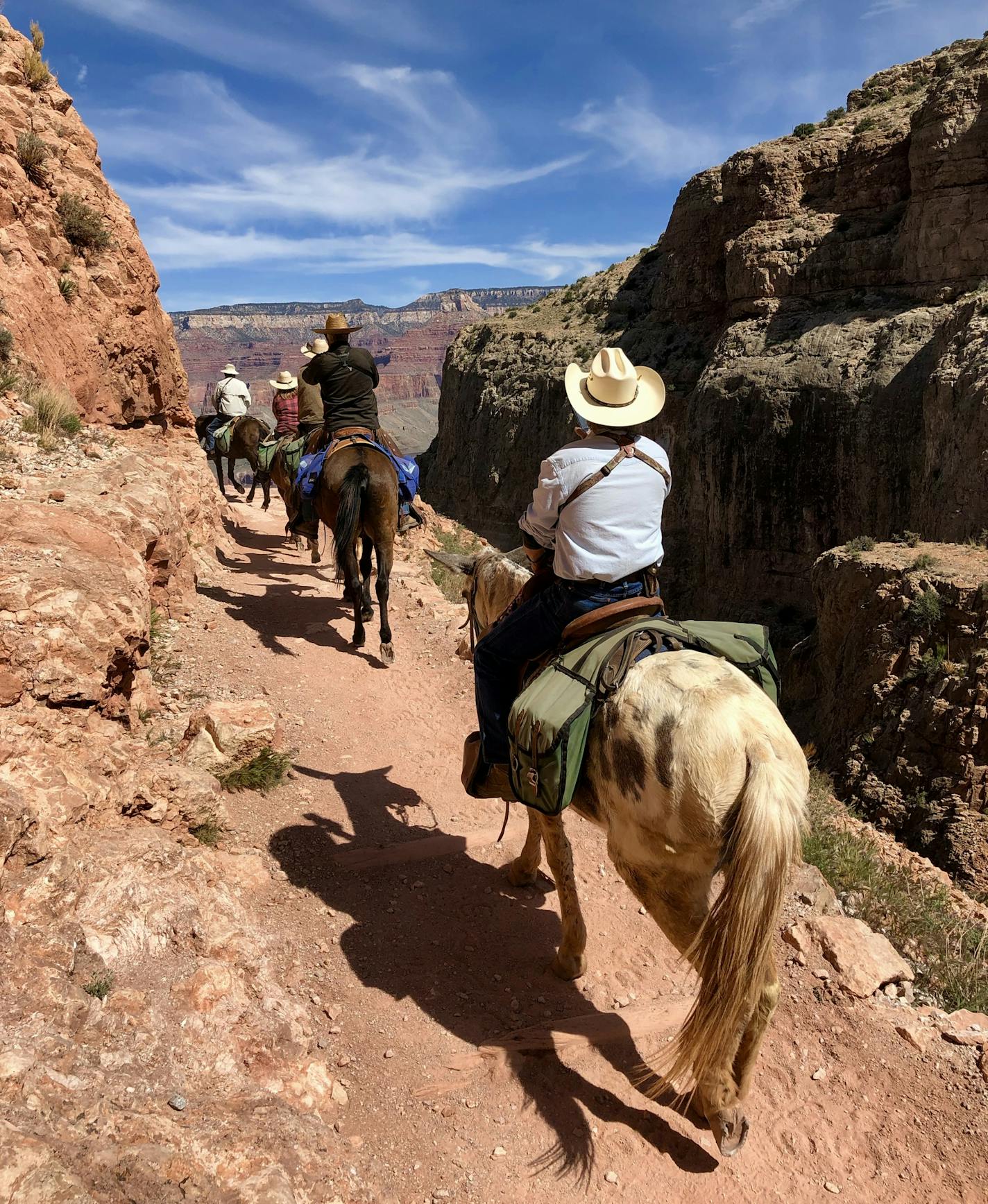 Hiking the Grand Canyon in one day, down and up, requires an early start, but the rewards include beautiful vistas and snow on the North Rim.