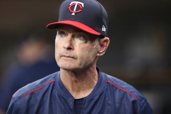 FILE - In this June 12, 2018, file photo, Minnesota Twins manager Paul Molitor is seen in the dugout during the third inning of a baseball game agains