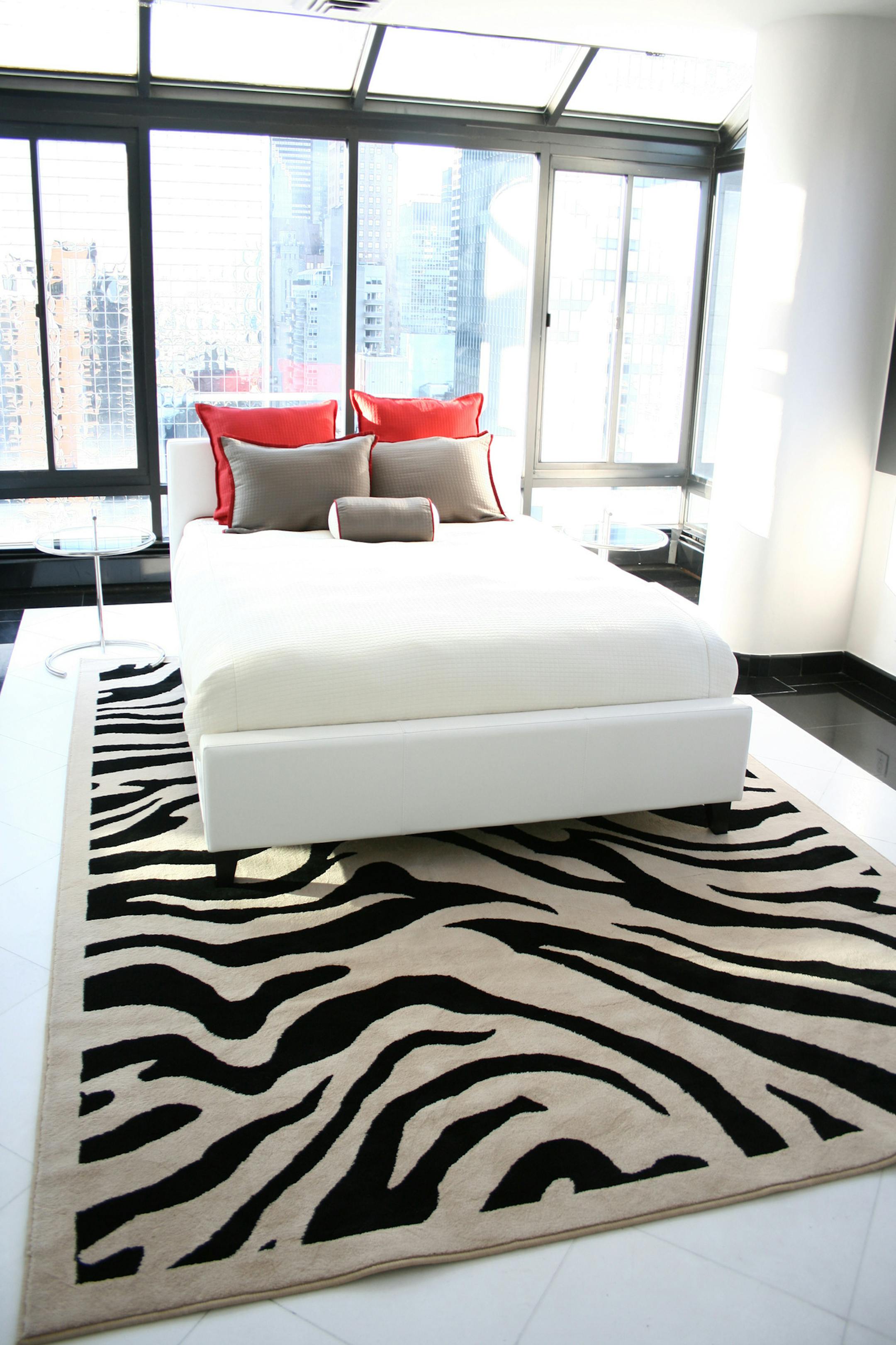 A classic combination of red, white and black is highlighted by a zebra print rug. (Handout/TNS) ORG XMIT: 1173639