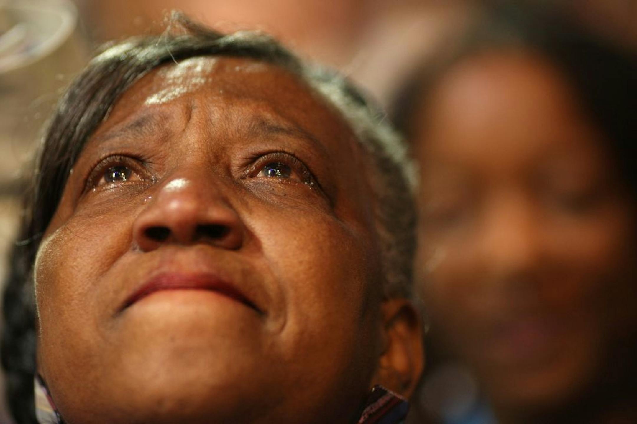 Tears streamed down the face of Lucy Buckner-Watson of Inver Grove Heights as the Minnesota delegation celebrated the nomination of Sen. Barack Obama for president.