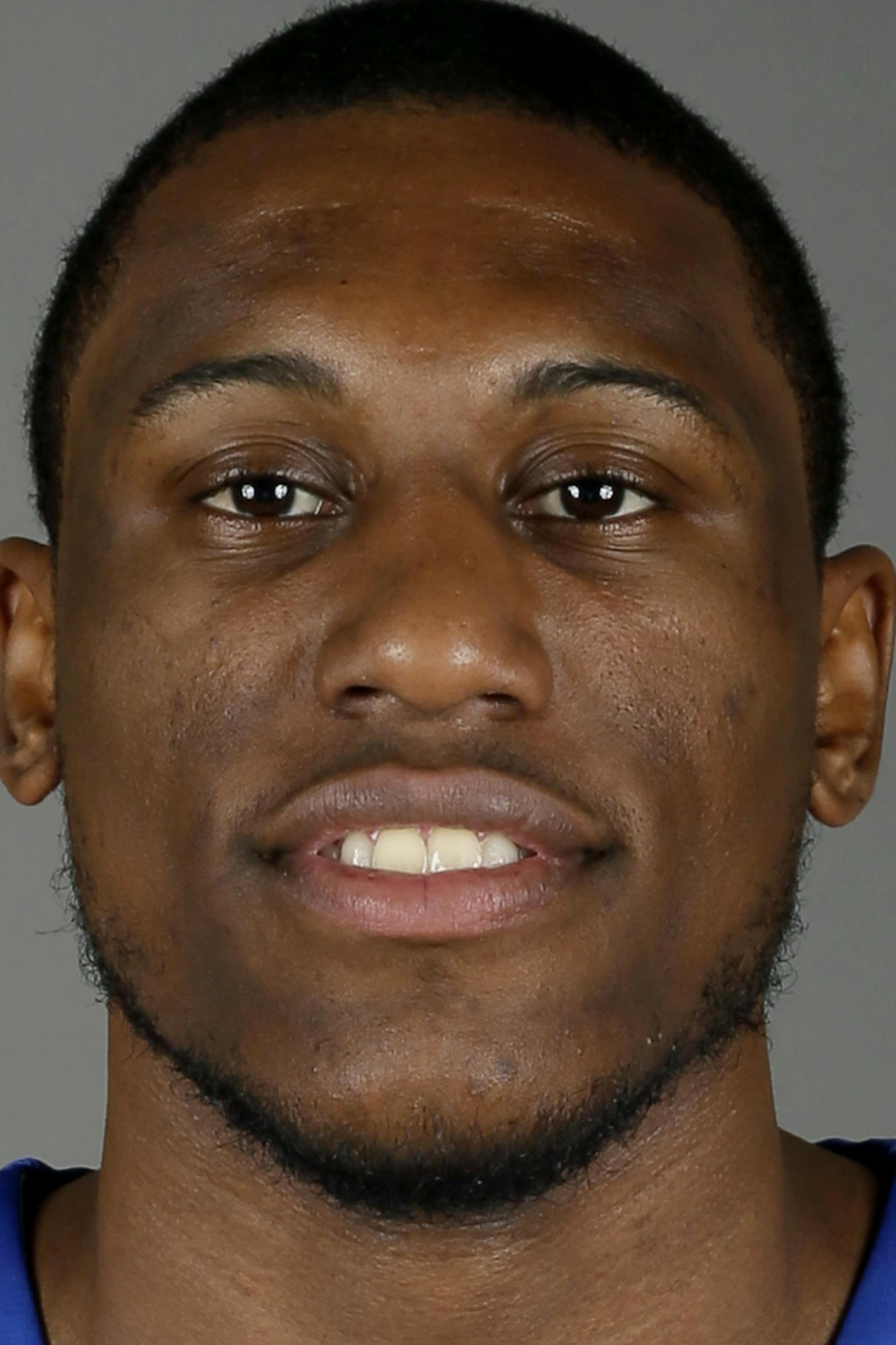 Philadelphia 76ers' Thaddeus Young poses for a photograph during media day at the team's practice facility, Friday, Sept. 27, 2013, in Philadelphia. (AP Photo/Matt Slocum) ORG XMIT: NYOTK