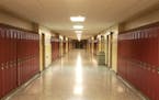 Empty School Hallway with Student Lockers Children who need school as a safe space will suffer during this pandemic.