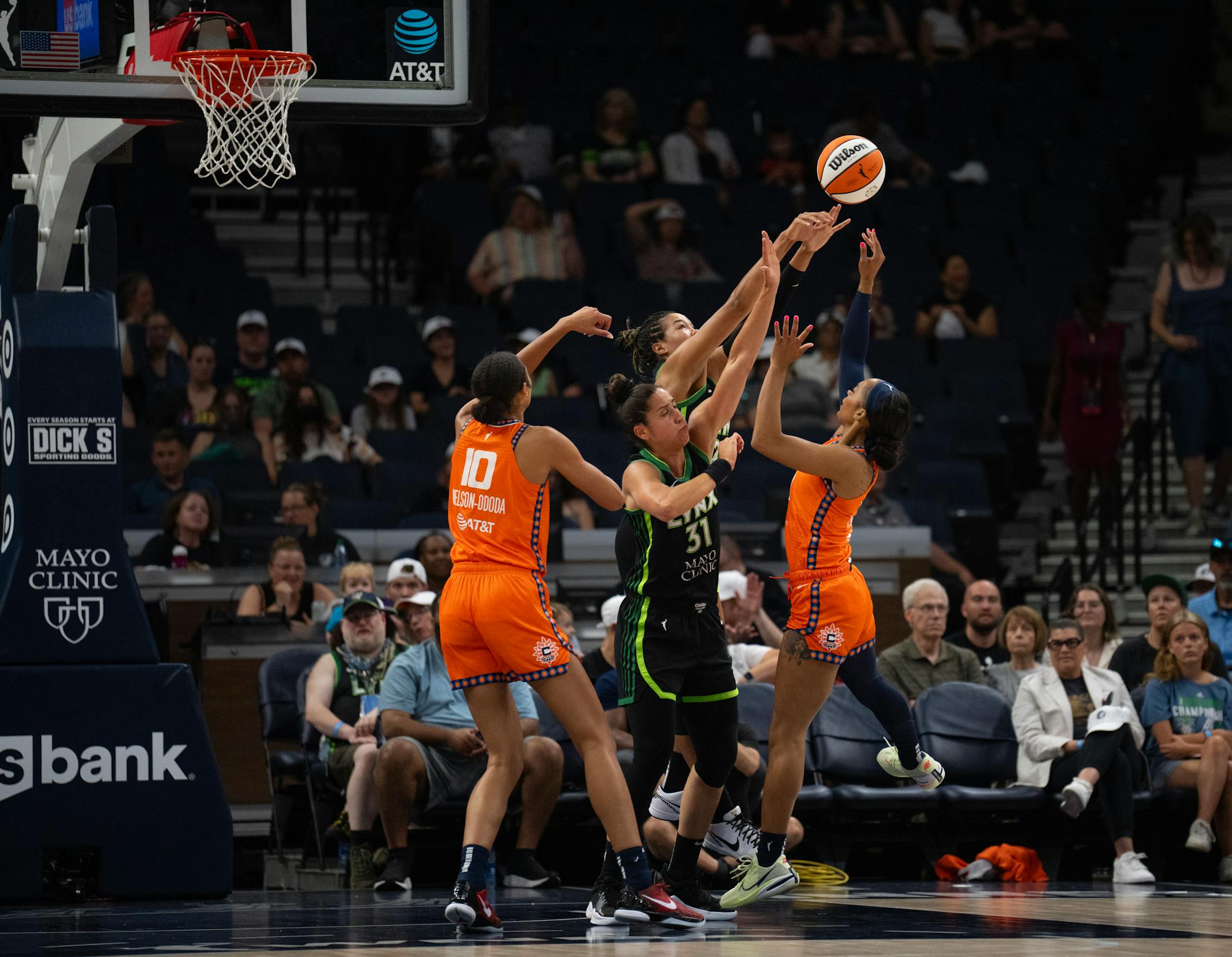 Minnesota Lynx forward Napheesa Collier (24) blocked a shot by Connecticut Sun guard DiJonai Carrington (21) with help from Lynx forward Nikolina Milic (31) in the first quarter Thursday night. The Minnesota Lynx faced the Connecticut Sun in a WNBA game Thursday night, June 22, 2023 at Target Center in Minneapolis.