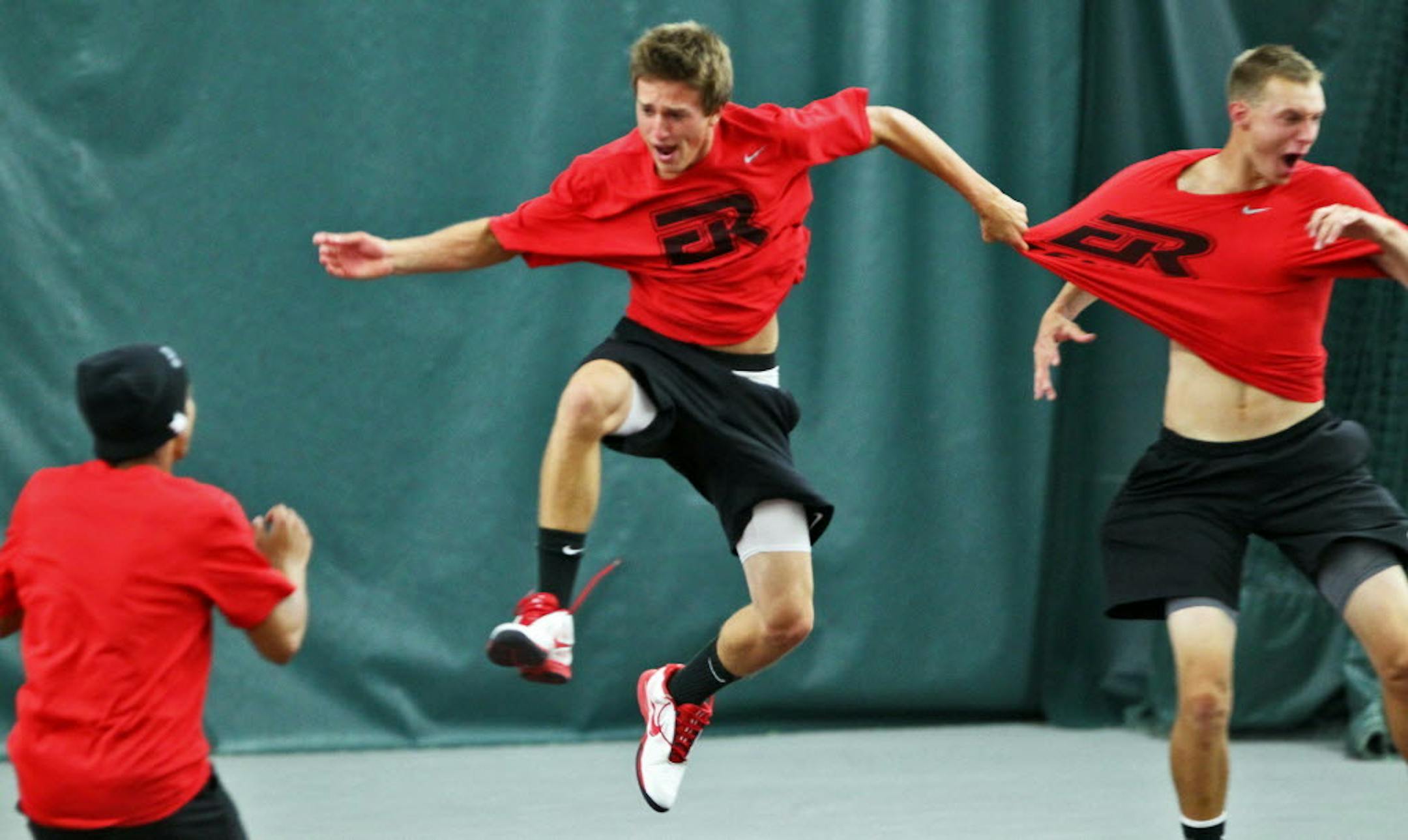 Elk River tennis players Steven Delain, center, and Mitch Brandell, right, whooped it up after clinching a 5-2 Class 3A title victory over Wayzata on June 6 at Baseline Tennis Center at the University of Minnesota. Photo by Marlin Levison * mlevison@startribune.com