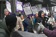 Several hundred members of SEIU Local 26 Twin Cities Secruity Officers pounded on pots, pans, drum and anything else that would make noise as they pic