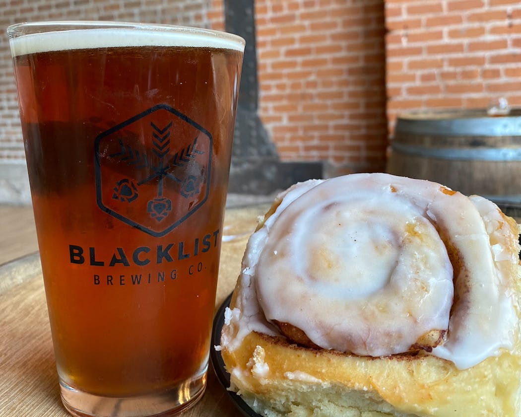 Duluth’s Blacklist Brewery has created a cinnamon roll-inspired beer for its collaboration with Duluth’s Best Bread.