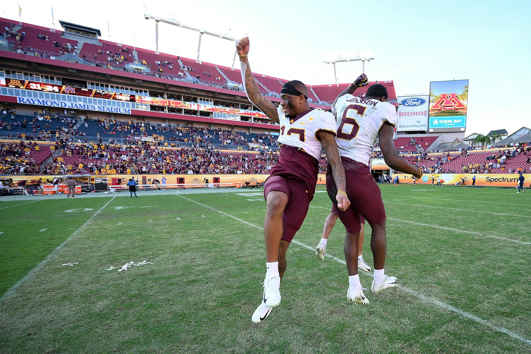 Minnesota Gophers wide receiver Rashod Bateman (13) and wide receiver Tyler Johnson (6) celebrated their Outback Bowl win over the Auburn Tigers.