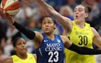Reigning WNBA MVP Breanna Stewart, right, is out this season with a ruptured Achilles tendon while the Lynx's Maya Moore, another MVP, is taking the y