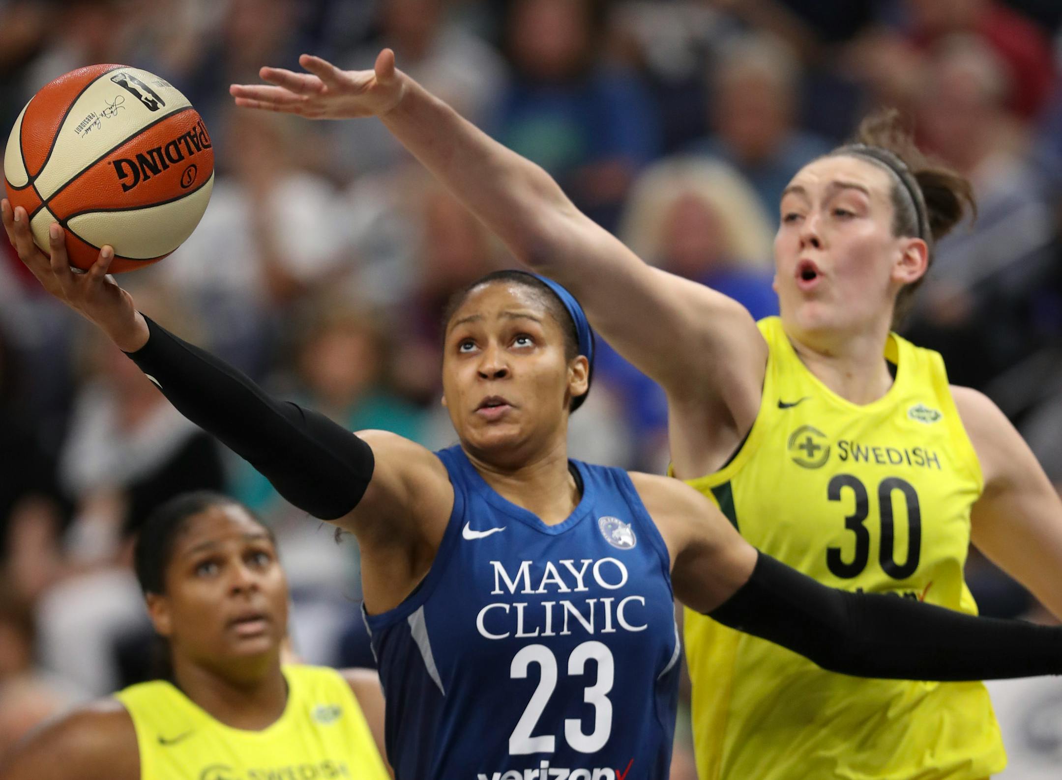 Reigning WNBA MVP Breanna Stewart, right, is out this season with a ruptured Achilles tendon while the Lynx's Maya Moore, another MVP, is taking the year off.