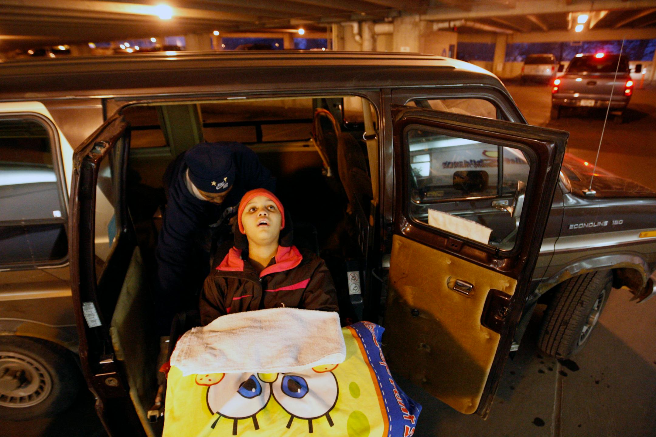 Steve Hall wheeled his daughter into a van for the ride to their new home in a south suburb. "I can't thank y'all enough for taking care of my daughter," Hall told the nurses.