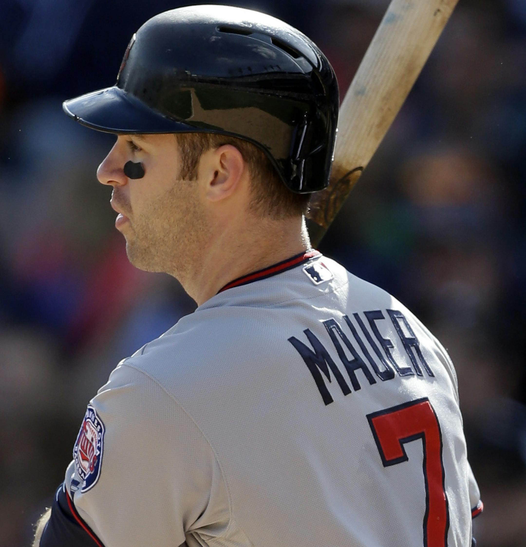 Minnesota Twins' Joe Mauer bats during the fourth inning of a baseball game against the Detroit Tigers in Detroit, Saturday, May 25, 2013.(AP Photo/Carlos Osorio)