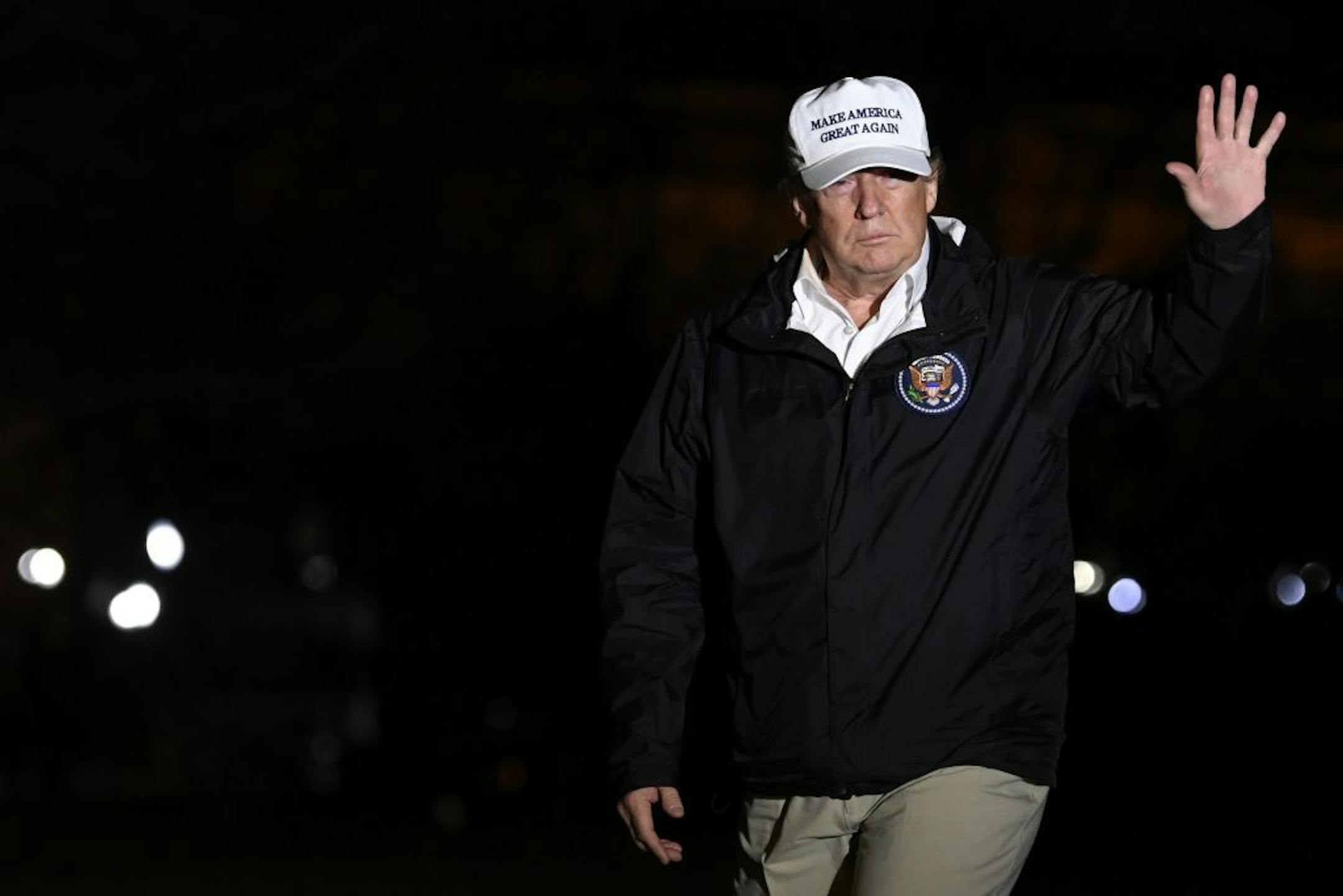 President Donald Trump walks on the South Lawn of the White House in Washington, Thursday, Jan. 10, 2019, after returning from a trip to the southern border.