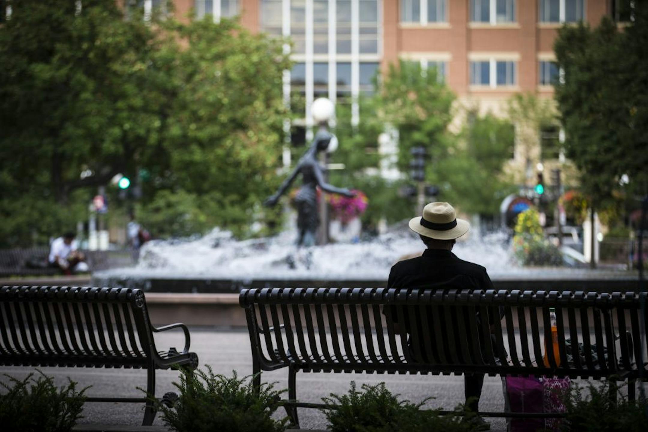 David Whitaker relaxed on a park bench at Rice Park on Monday, August 18, 2014 in St. Paul, Minn.