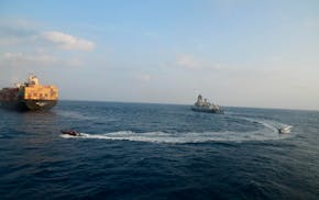 This photograph shared by Indian navy on the X platform shows a firefighting team from Indian Navy vessel INS Kolkata responding to a fire on Liberian