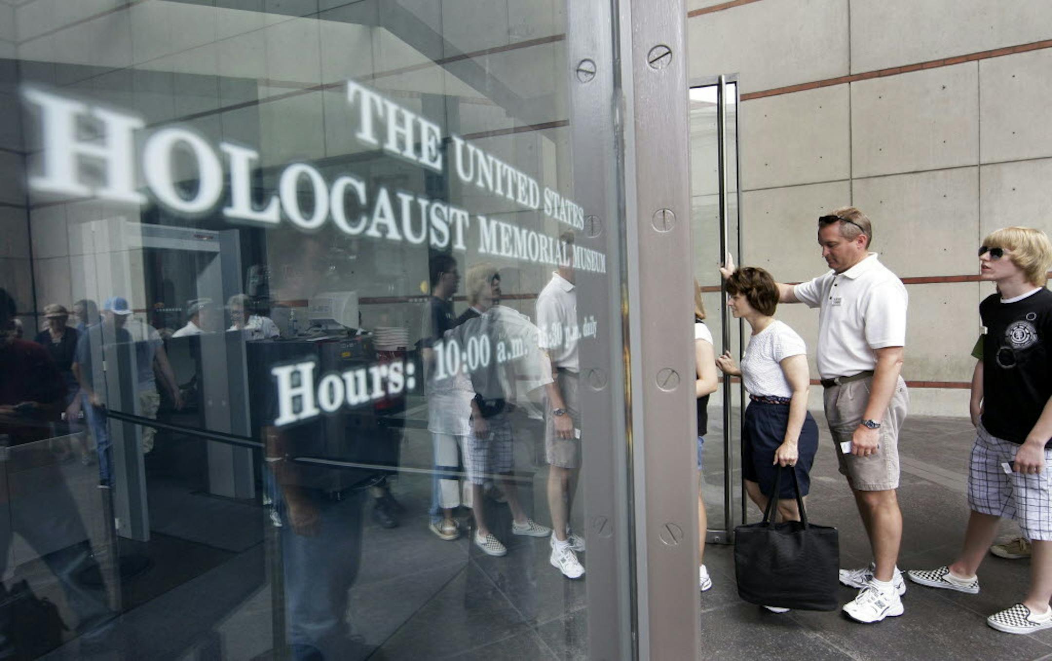 In this June 12, 2009 file photo, people line to enter the U.S. Holocaust Memorial Museum in Washington.