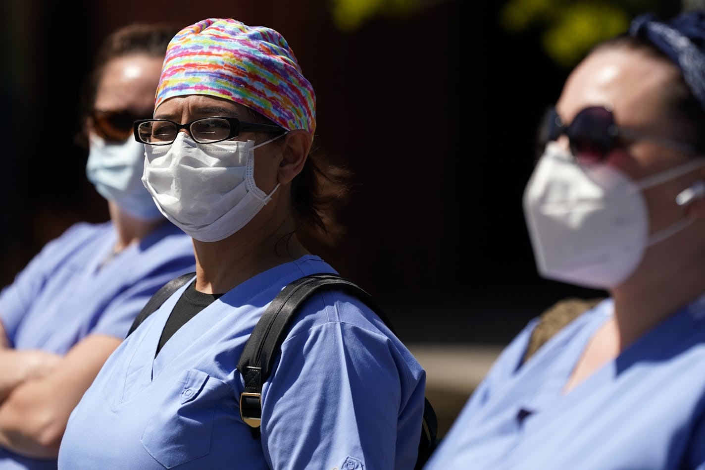 Health care workers staging a counter protest blocked traffic from those protesting the Stay Home MN orders meant to slow the spread of COVID-19 at the State Capitol Saturday.