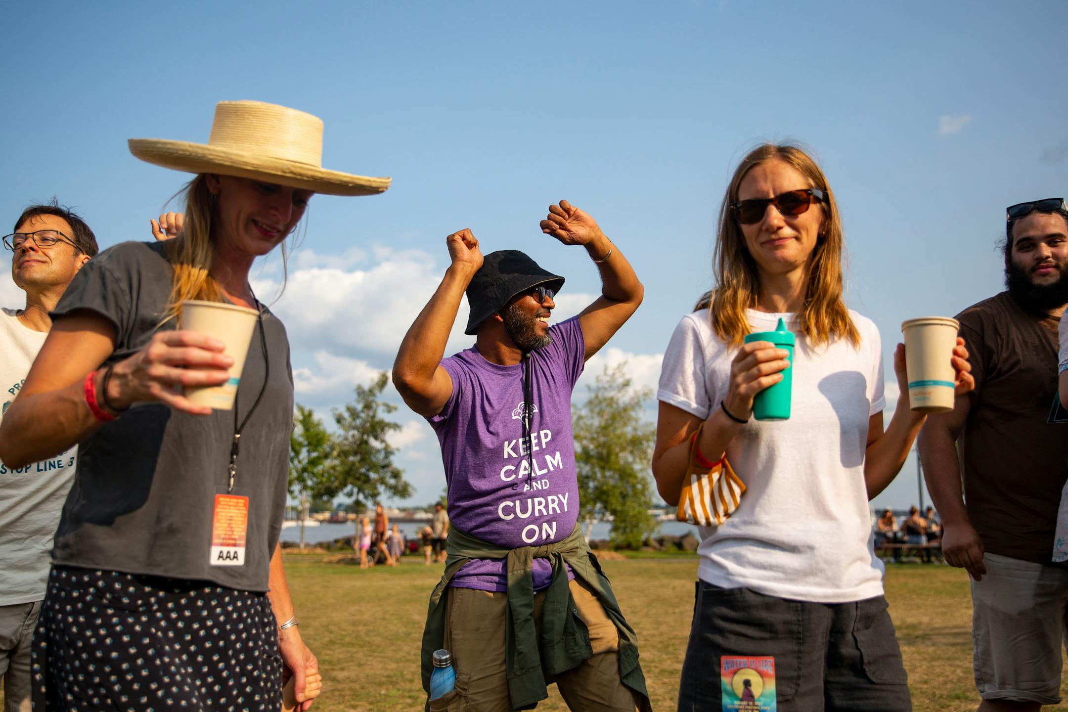 A group of fair goers performed a round dance as Keith Secola performed on the side stage at the Water is Life Festival on Wednesday.