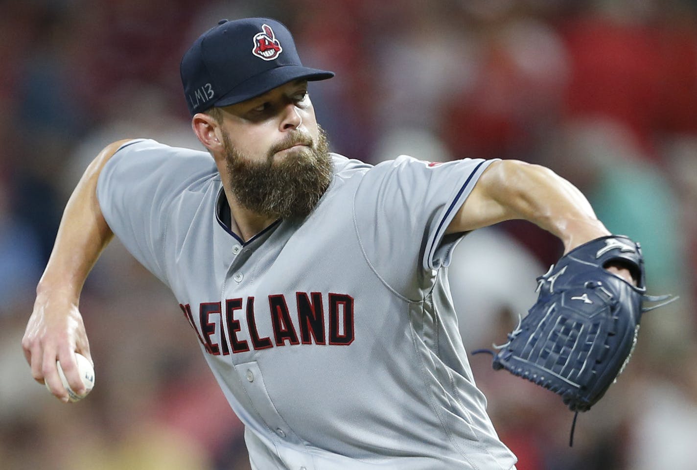 Cleveland Indians starting pitcher Corey Kluber throws against the Cincinnati Reds during the seventh inning of a baseball game, Tuesday, Aug. 14, 2018, in Cincinnati. (AP Photo/Gary Landers)