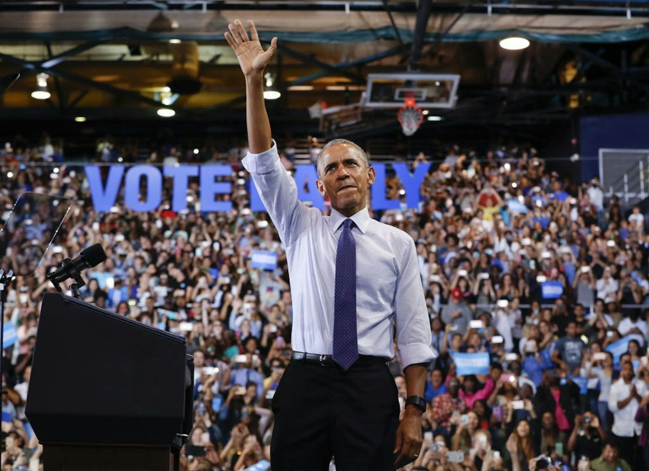 FILE -- Then-President Barack Obama waved to supporters at Florida International University in Miami, Thursday, Nov. 3, 2016, during a campaign rally for Democratic presidential candidate Hillary Clinton.