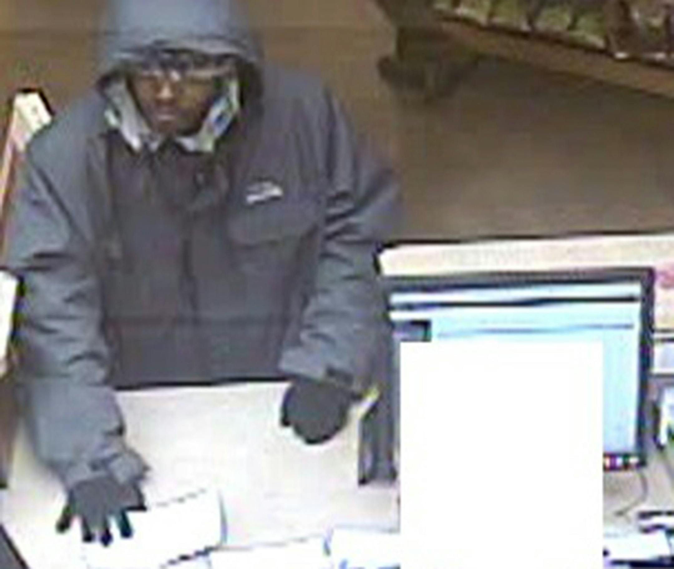 w/BANK011116 Caption: Bank robbery surveillance photo. Tellerís image was obscured by police. Credit: Roseville police